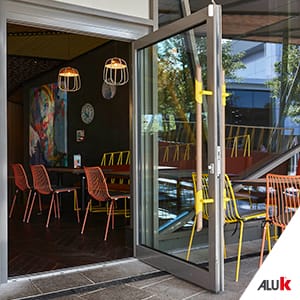 Close up of a entrance door to the Nandos Restaurant 